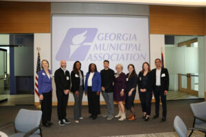 Photo by Atlanta Regional Commission on March 11, 2025. May be an image of 9 people, people standing, office and text that says '이A GEORGIA MUNICIPAL ASSOCIATION ૨'.
