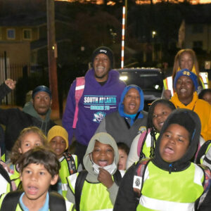 Photo shared by The Atlanta City Council on March 20, 2025 tagging @antoniolewisatl. May be an image of 7 people, people standing, road and text that says '육의전 SOUTH SOUTHATLANTA ATLANTA -HORNETS- TS iS- HORNE S0 粉 茶'.