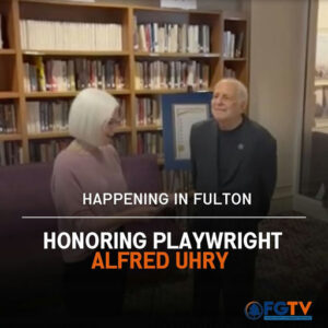 Photo shared by Fulton County Government TV on April 01, 2025 tagging @fultoninfo, @fultonarts, @alfreduhry, and @commishbarrett. Pode ser uma imagem de 2 pessoas, televisão e texto.