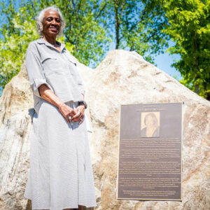 Photo by The Atlanta City Council on April 16, 2025. May be an image of 2 people, people standing, grave stone, park and text.