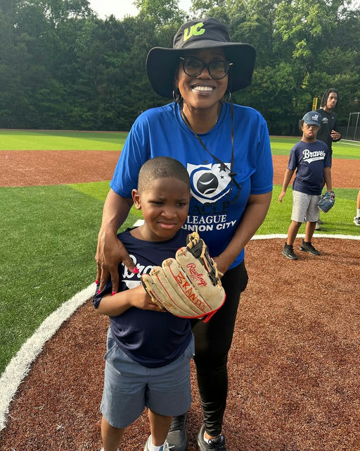 Photo by Union City, GA on May 16, 2025. May be an image of 2 people, people smiling, people playing baseball, people playing softball, ball, park and text.
