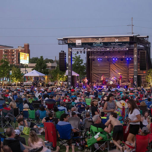 Photo shared by City of Sandy Springs on May 16, 2025 tagging @visitsandysprings, @cityspringsdistrict, and @eltonbillytribute. May be an image of crowd, park and text.