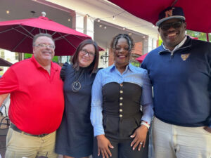 Photo by Atlanta Heights Charter School on May 08, 2025. May be an image of 4 people, people smiling, people standing and text.