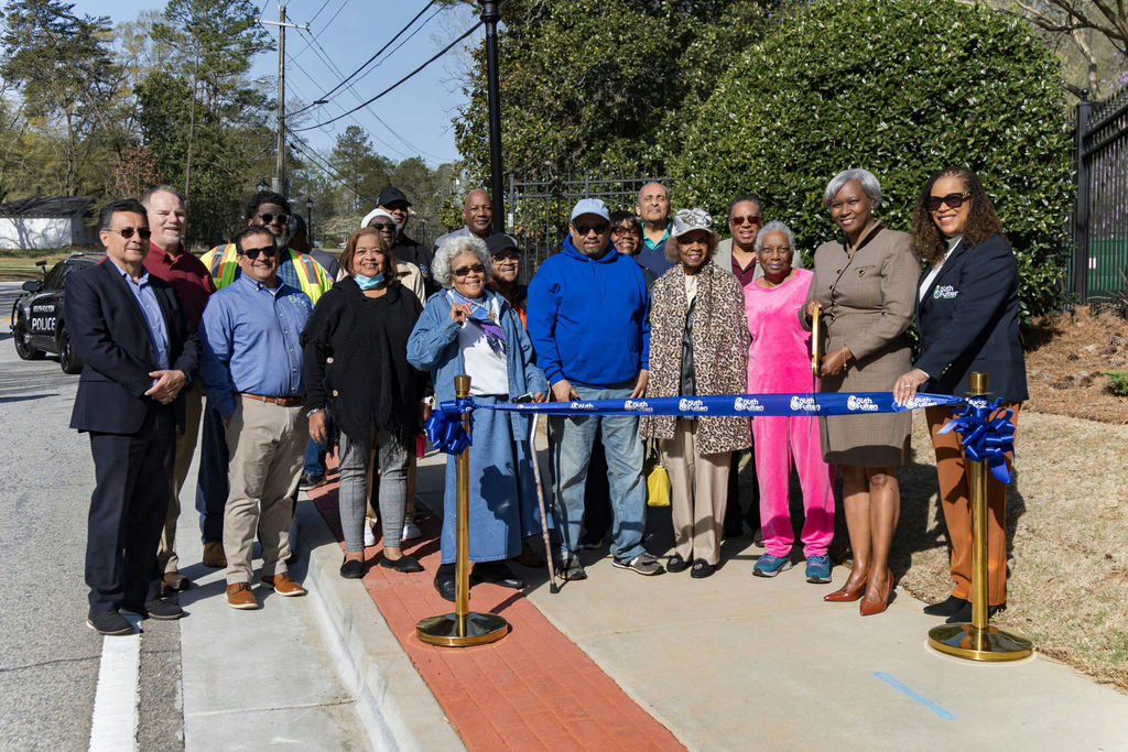 Celebrate a momentous achievement as South Fulton proudly unveiled the completion of the Danforth Road Sidewalk Improvements! This project symbolizes a significant leap forward in enhancing both connectivity and safety for our community. The ribbon-cutting ceremony was a testament to the city's ongoing commitment to creating a safer, more accessible environment for all residents. As South Fulton continues to rise, each development like this plays a vital role in shaping a prosperous future. Witnessing this progress, one project at a time, underscores the dedication to building a supportive and thriving community infrastructure. To remain connected with future developments and community improvements, stay engaged with local South Fulton updates and initiatives. #SouthFultonRising #CommunityConnectivity #InfrastructureProgress #DanforthRoadImprovements
