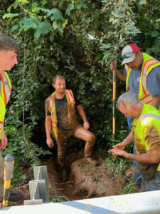 Photo by City of Roswell, Georgia on June 21, 2025. May be an image of 4 people, shovel and text.