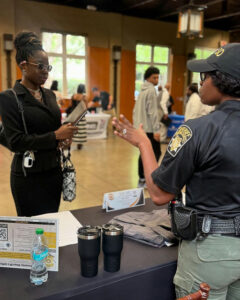 Photo by Fulton County Sheriff's Office on June 12, 2025. May be an image of 4 people, people standing and text.