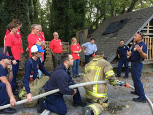 Photo shared by City of Sandy Springs on March 11, 2025 tagging @sandyspringsgafiredept. May be an image of 11 people and text that says 'SANDY SPRINGS'.