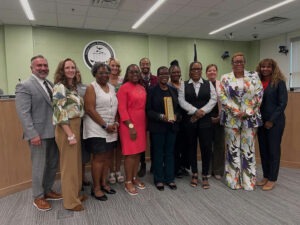 Photo by Fulton County Schools on September 19, 2025. May be an image of 8 people, office and text.