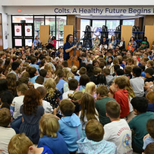 Photo by City of Milton, Georgia on September 10, 2025. May be an image of 3 people, crowd and text that says 'Colts, A Healthy Future Begins P हষ PASTBILLSY'.