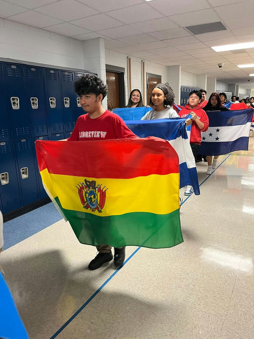 Photo by Fulton County Schools on September 15, 2025. May be an image of 6 people, flag and text.