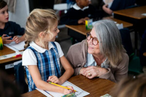Photo by Atlanta Classical Academy on October 07, 2025. May be an image of 5 people, child, people studying, eyeglasses and text.