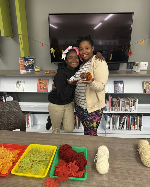 Photo by Fulton County Library System on October 22, 2025. May be an image of one or more people, loom, lego and text.