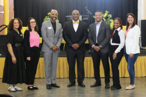Photo by Atlanta Public Schools on October 24, 2025. May be an image of one or more people, people standing, dais, office and text.