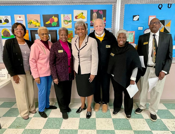 Photo by Catherine Rowell on January 16, 2026. May be an image of one or more people, people standing, office and text that says 'Py e N M a ardsan 版'.